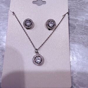 Elegant Silver Jewelry Set with Crystal Accents.